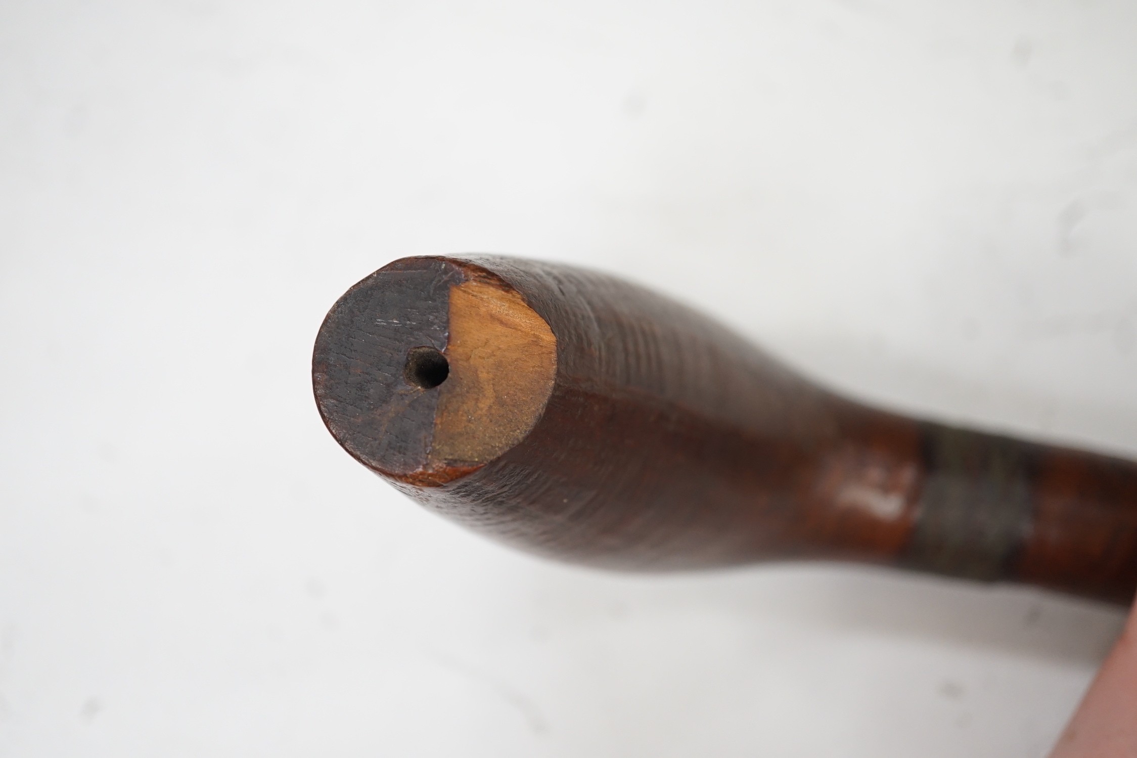 A Polynesian wood throwing club, 40cm tall